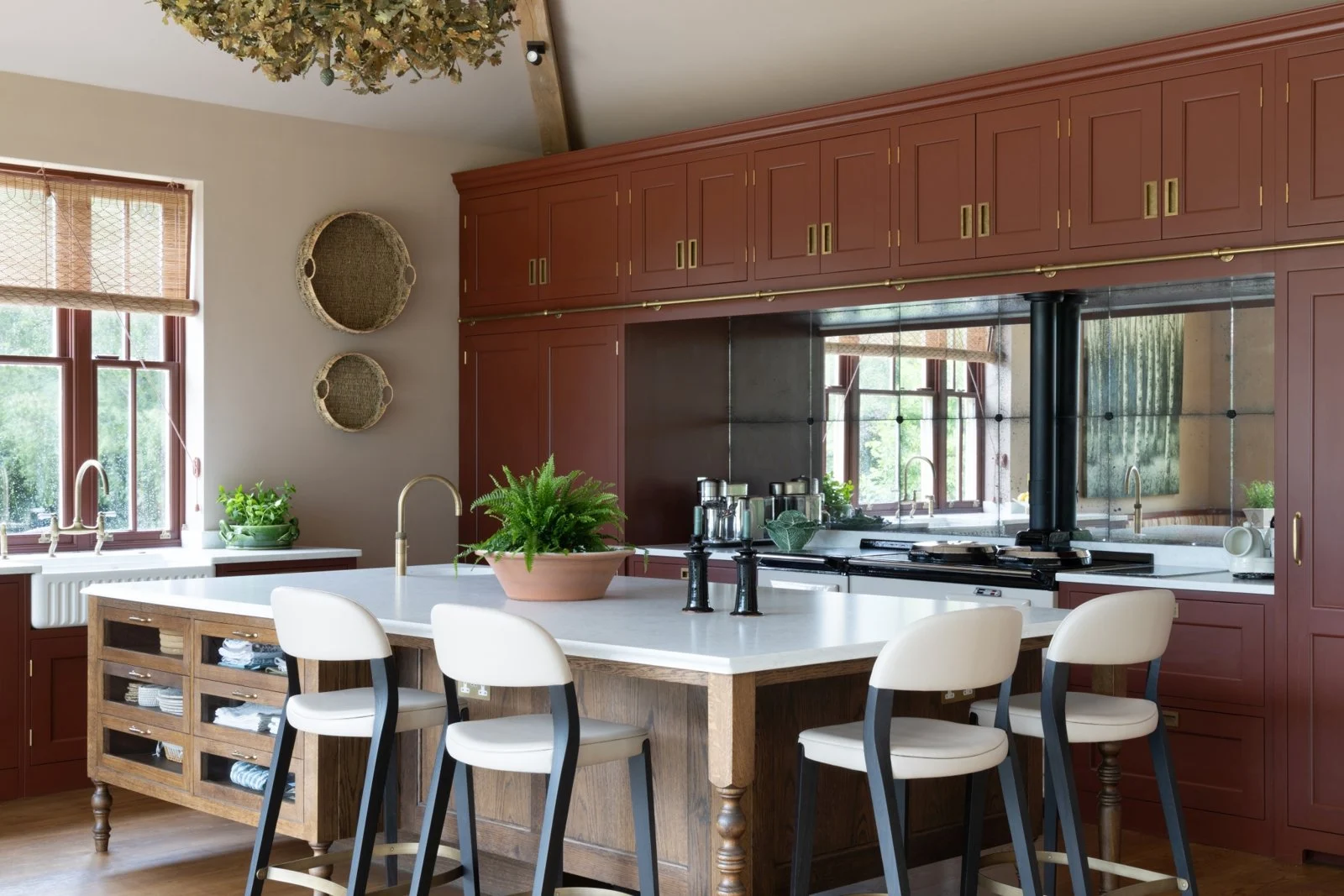 Scarlet painted Shaker cabinetry and a Jacobean oak island at Bells Yew Green